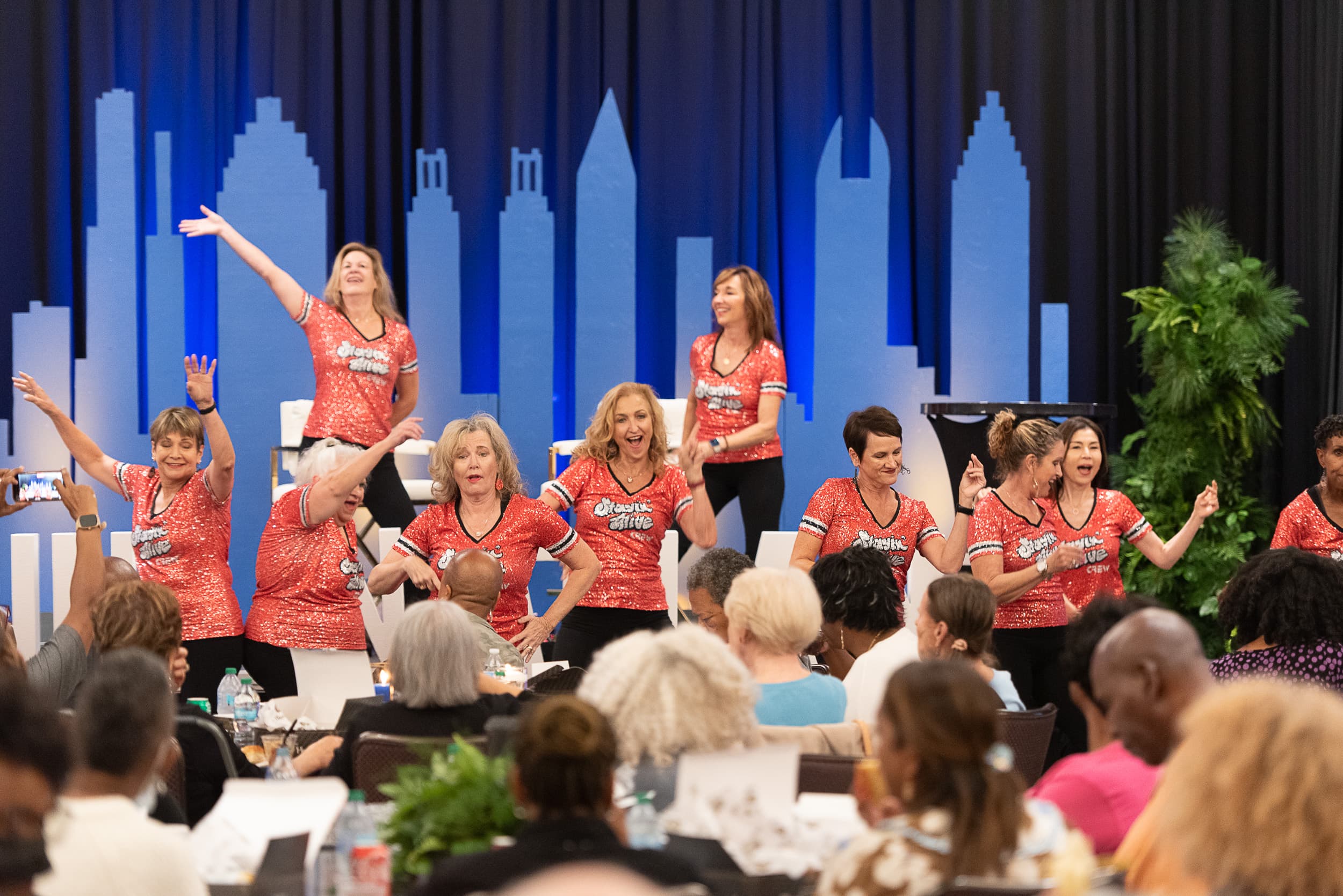 Atlanta Braves entertainment team performing at AJC Live Aging in Atlanta conference
