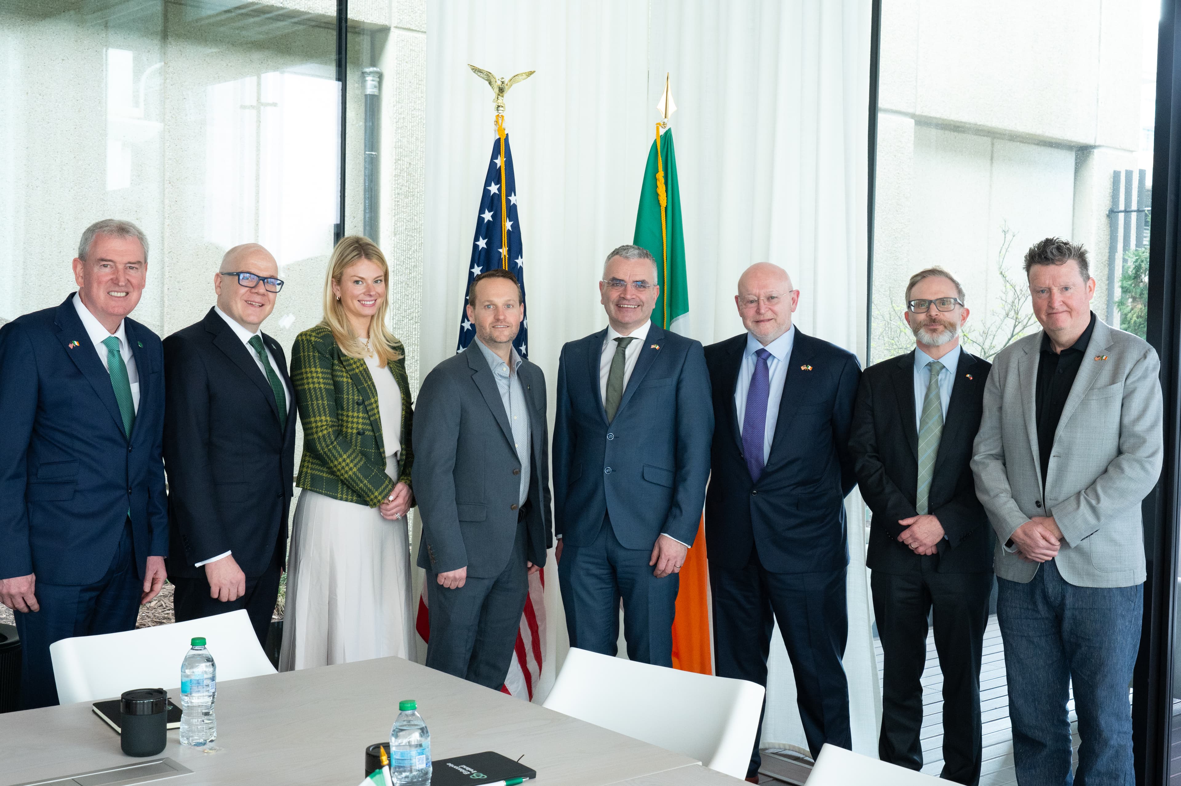 Enterprise Ireland leadership group photo with U.S. and Irish flags at Atlanta office opening