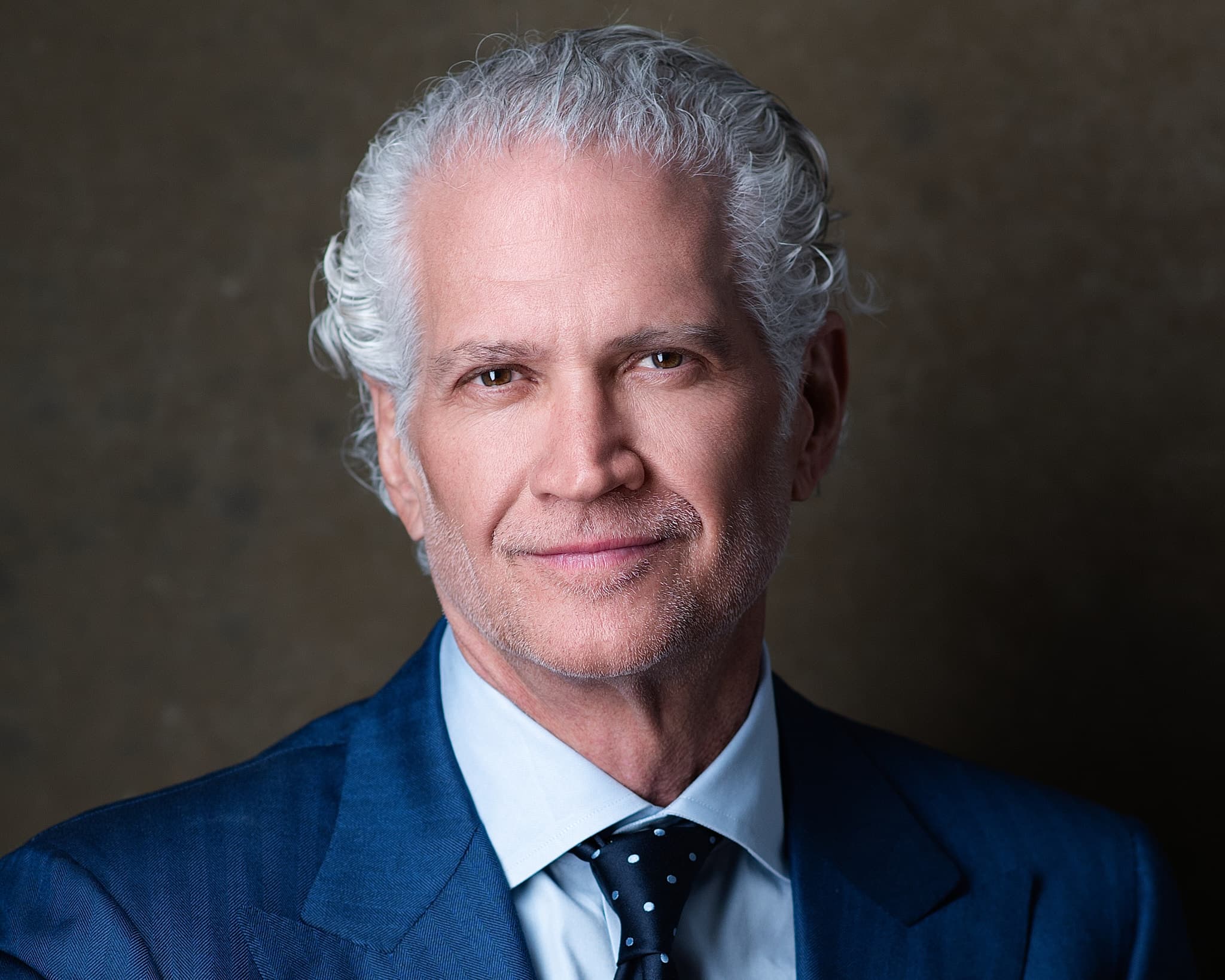 Business executive in professional attire — corporate headshot session